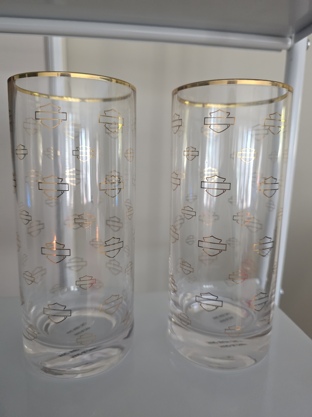 Harley Davidson high ball glasses (2) gold rimmed bar & shield